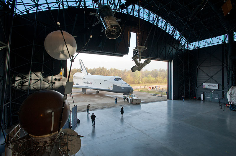 Final wheels stop: Space shuttle Discovery enters the Smithsonian