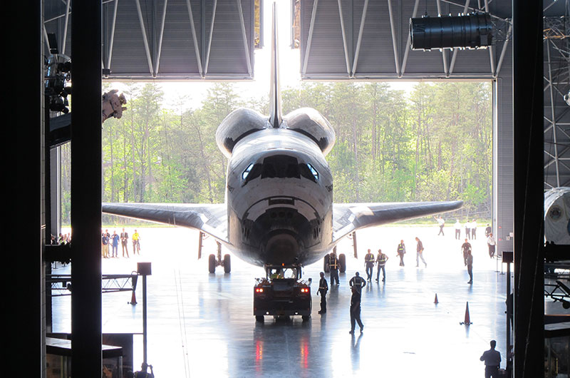 Final wheels stop: Space shuttle Discovery enters the Smithsonian