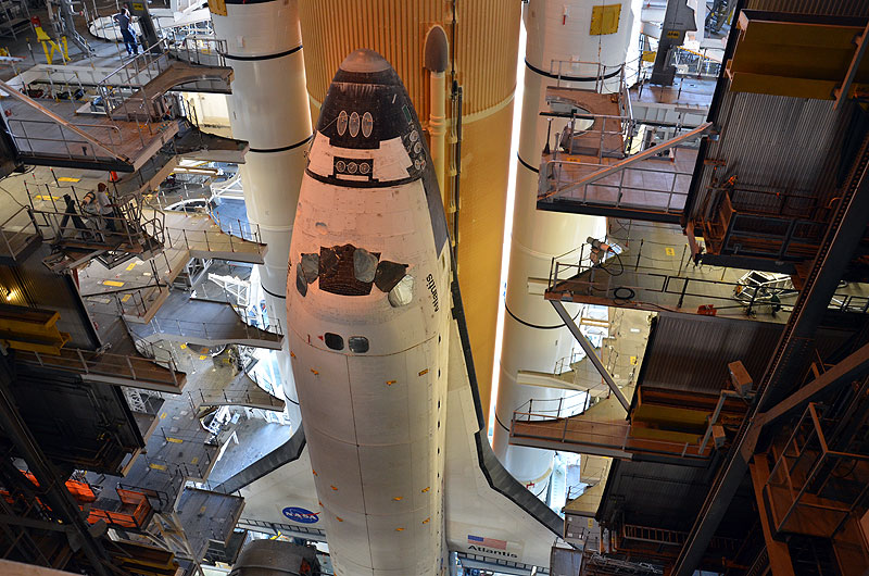 Final shuttle rolls out to launch pad as next-to-last lands