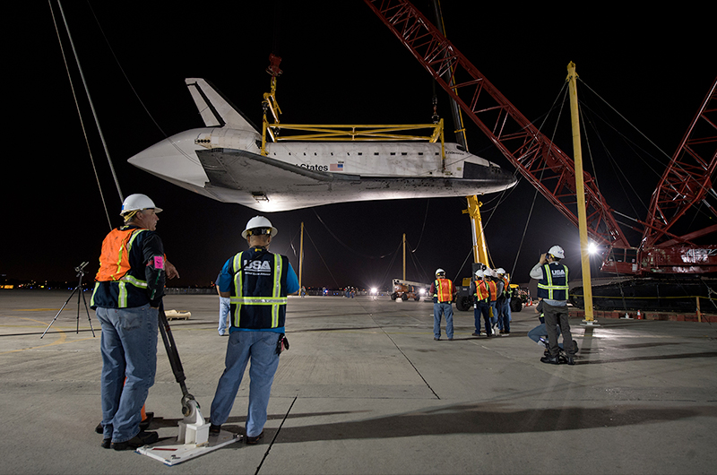 Shuttle Endeavour hoisted off jet for road trip to L.A. museum