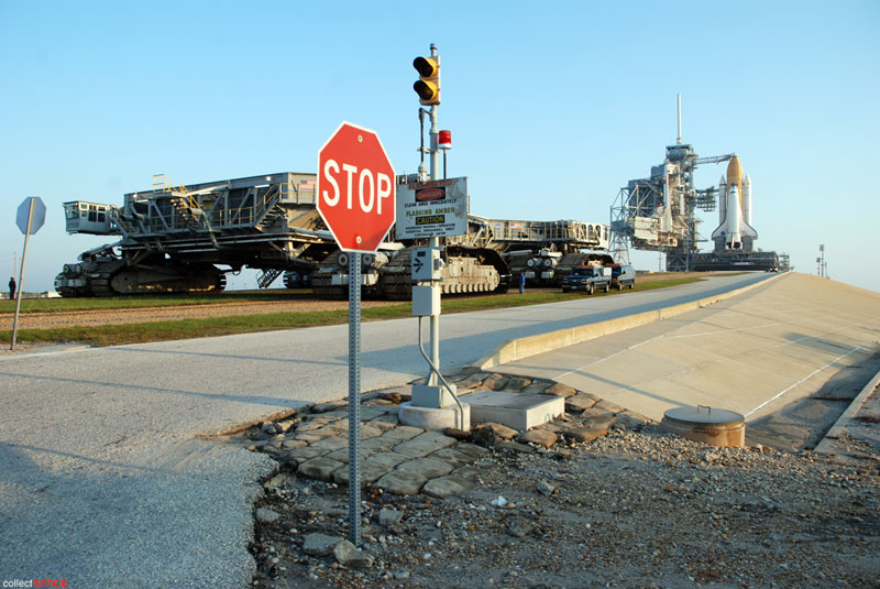 Atlantis and astronauts at the pad